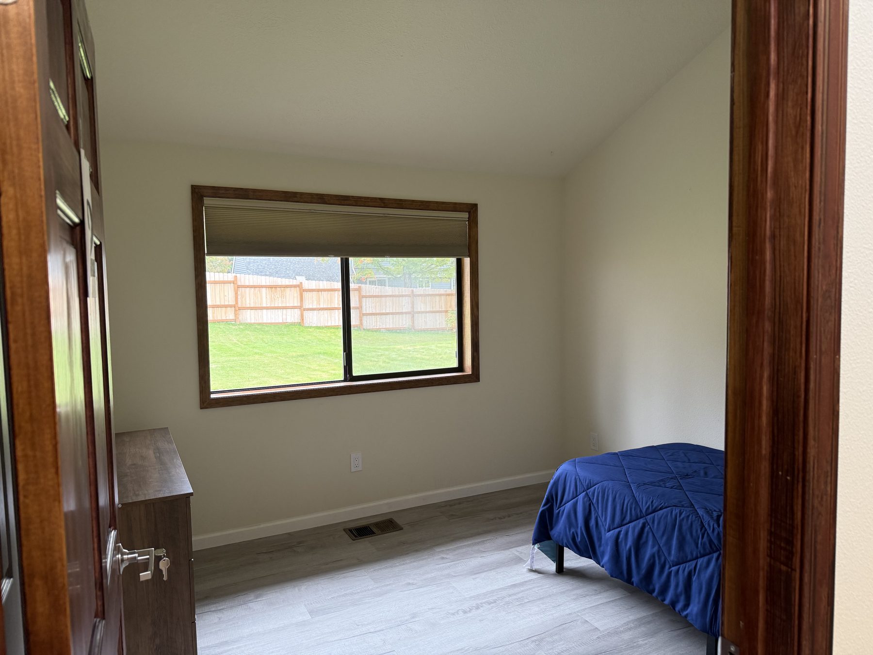 Bedroom with backyard view