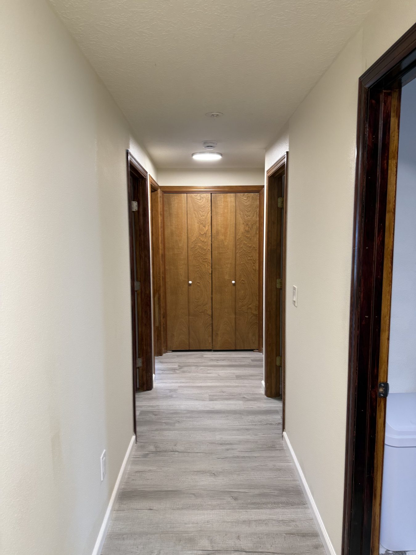 Hallway with closet doors
